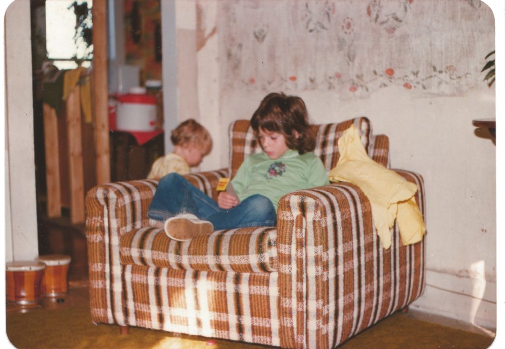 Diana and her brother in her childhood home